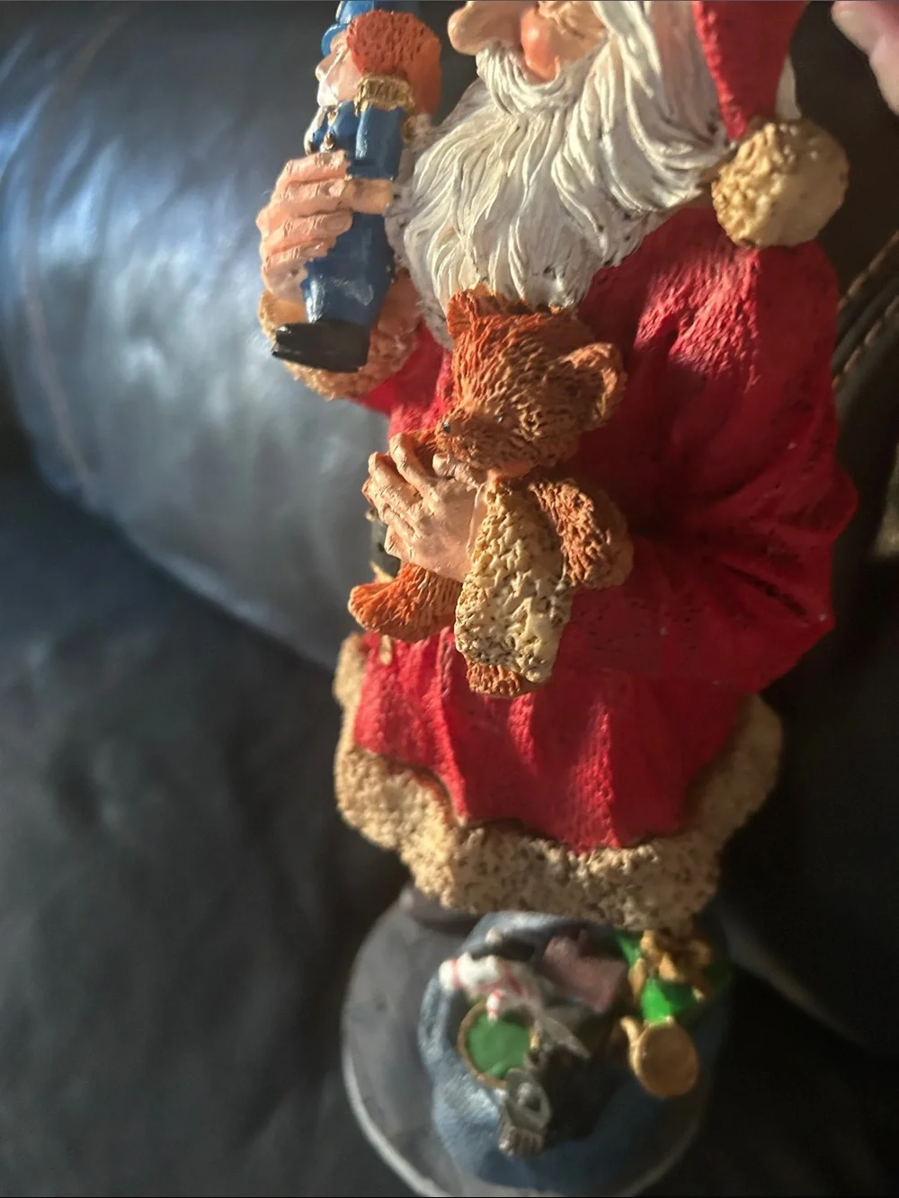 Vintage old, looking Red and Cream Santa Figurine Holding Nutcracker